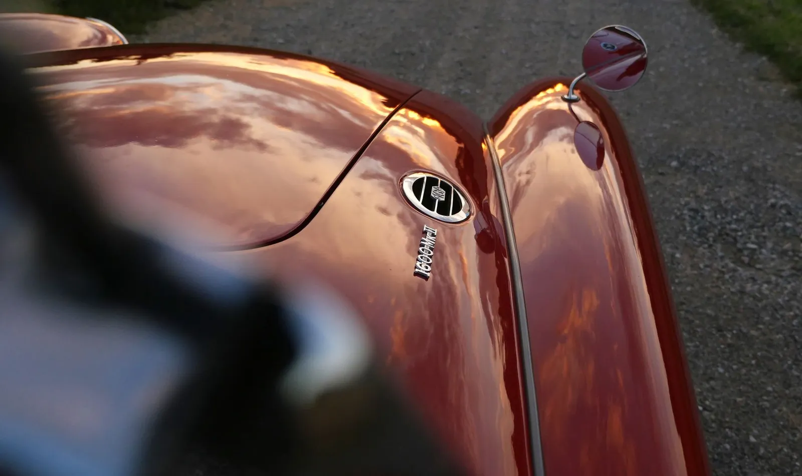 Deep gloss on a coated hood at sunset — what a proper LA ceramic install looks like