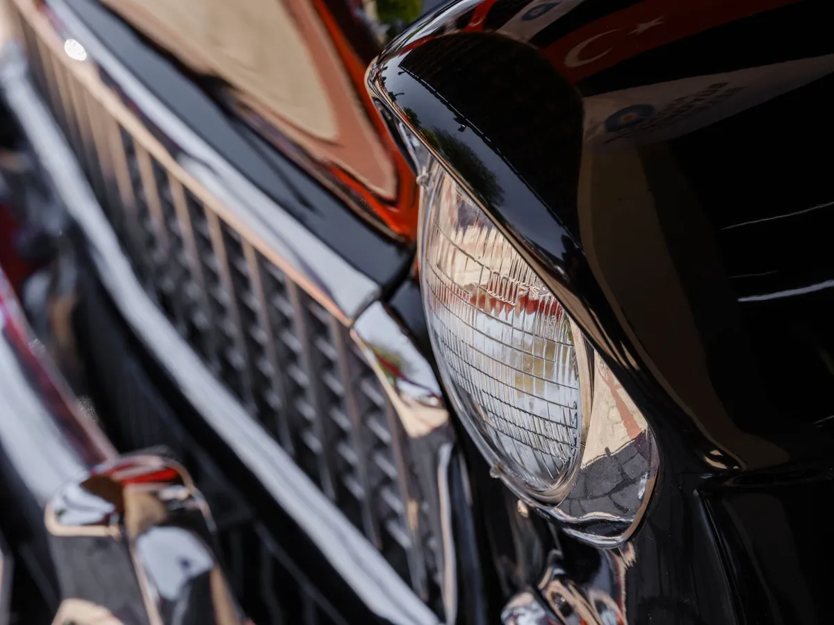 Deep wet gloss on coated paint — the finish a proper prep-and-coat process pays back