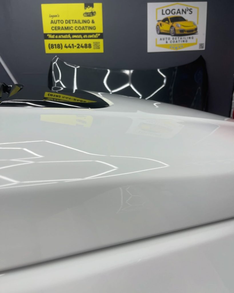 Car with a glossy finish after detailing at Logan's Auto Detailing