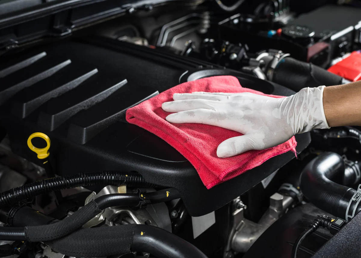 Engine Bay or a black car being cleaned